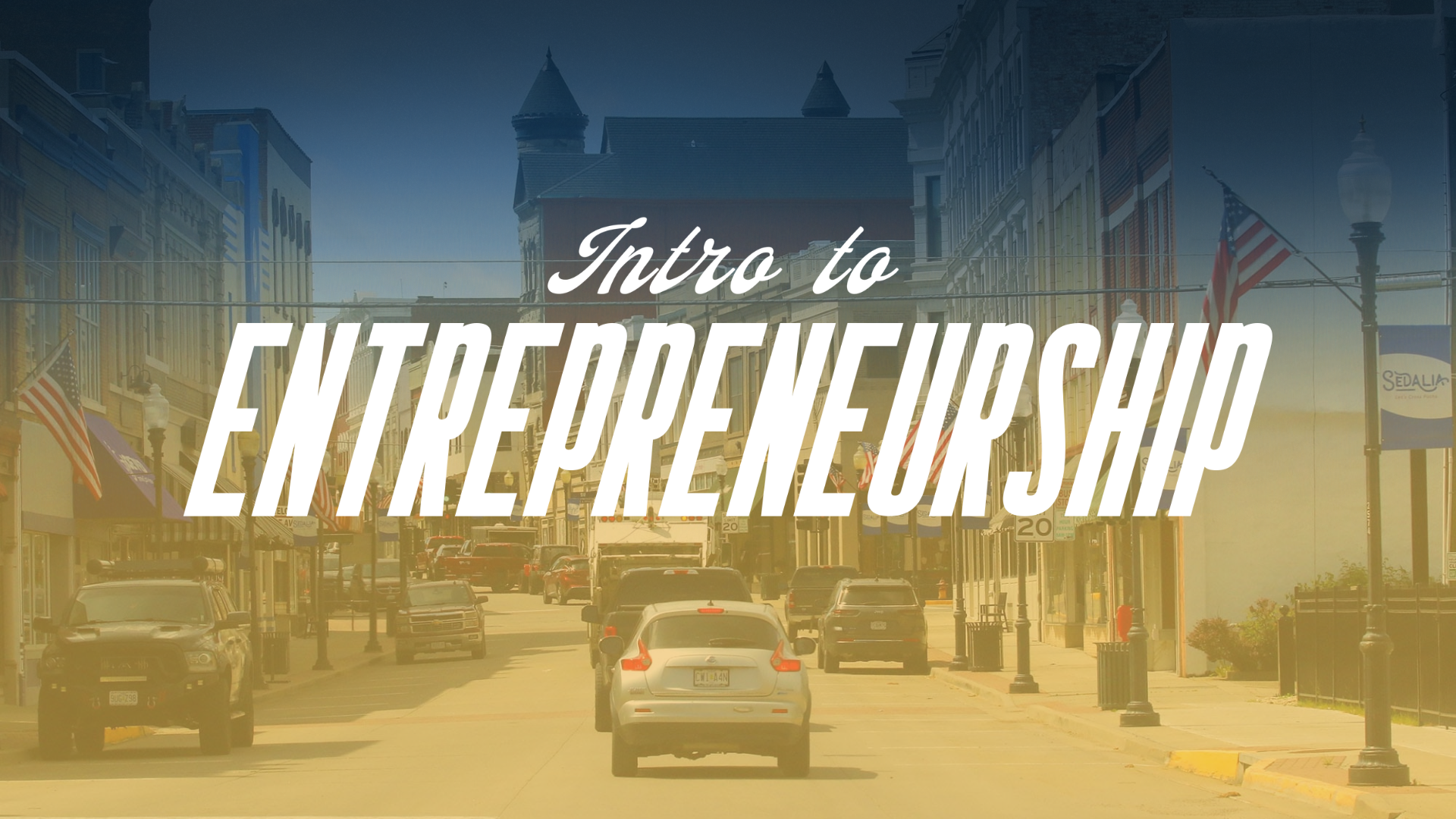 Intro to entrepreneuship written on top of Sedalia's main street picture